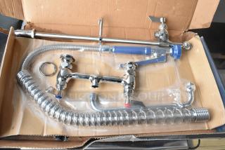 Brand new Waterloo 750PRD812 deck-mounted pre-rinse faucet, 1.15 GPM, 8" centers, 12" add-on faucet, scratch and dent condition.