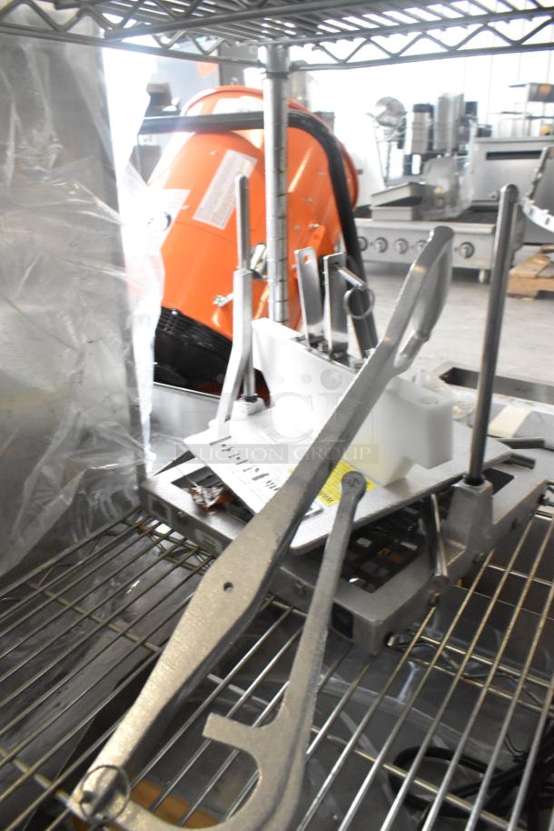 3 new Vollrath 4400N Redco Lettuce King IV vegetable choppers. Includes French fry cutter. Minor scratches visible.