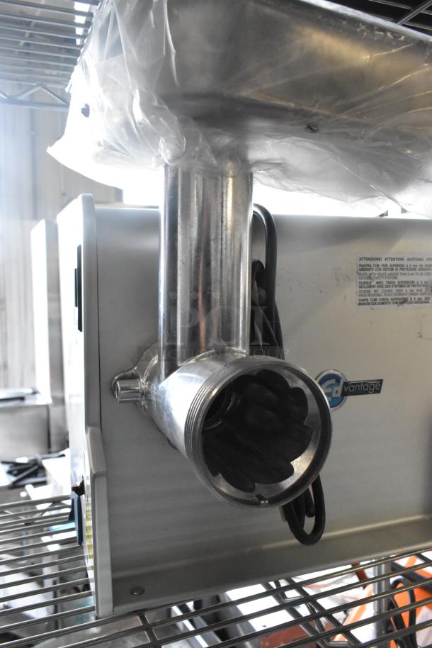 BRAND NEW Edlund EDVG-12A stainless steel electric meat grinder, showing grinder head. 120 Volts, #12, scratch and dent.