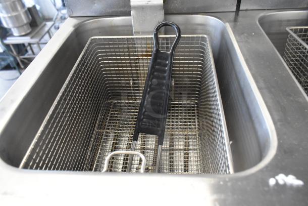 Avantco stainless steel 30 lb. dual tank electric fryer, model 177F202. Includes two metal baskets, medium-duty, 208-240V.