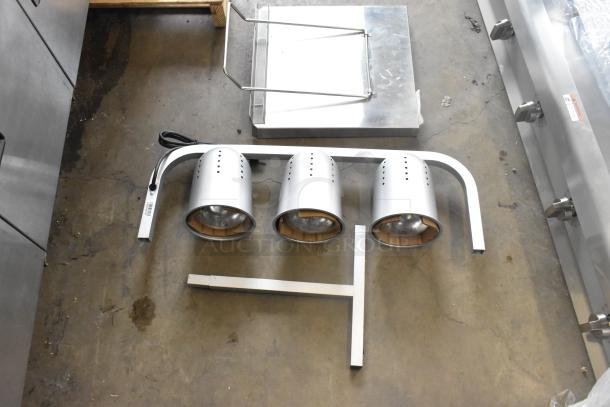 Avantco 177W63 heat lamp with three bulbs and T-legs, brand new, alongside funnel cake fryer component.