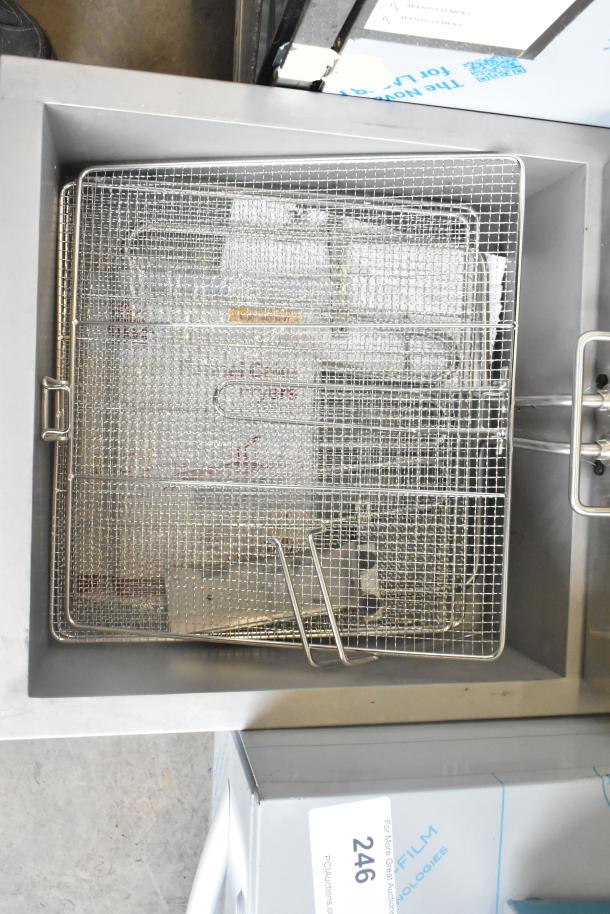 Carnival King 382DFC44001 stainless steel commercial 25 lb. fryer, new condition, slight scratches, 240V, 1 Phase.