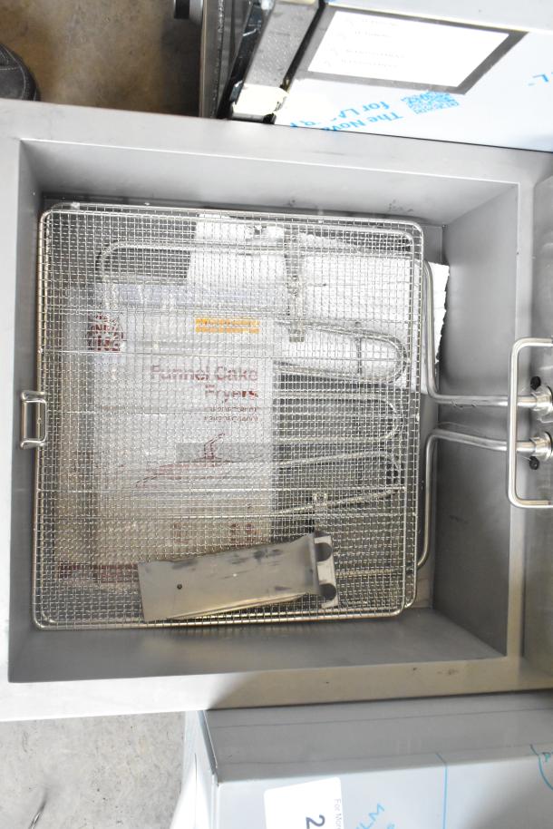 Carnival King stainless steel funnel cake/donut fryer, model 382DFC44001, 240V, scratch and dent, 25 lb capacity.