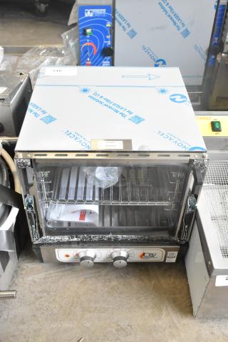 BRAND NEW SCRATCH AND DENT! Cooking Performance Group 351COQT3A  COQ-T3-A Electric Thermostatic Countertop 3 Tray Quarter Size Convection Oven. See Pictures for Broken Door Glass. 110 Volts, 1 Phase. - Item #1222875
