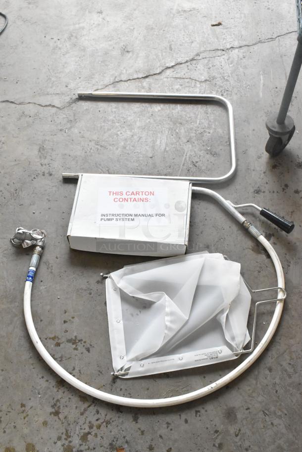 MirOil BD707 fryer oil filter machine with components. Includes pump system instruction manual. New scratch and dent condition.