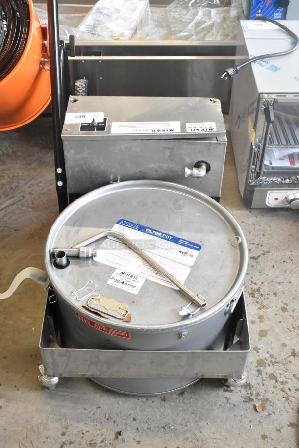 Brand new MirOil BD707 electric fryer oil filter, 75 lb. capacity, 1-way pump, 120V, 1/2 hp, minor scratches and dents.