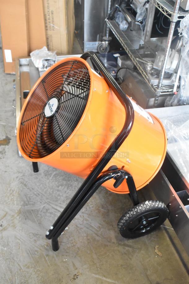 Brand new Boltic SHAG-K07F orange metal electric heater, floor style, 208V, 1 phase, with minor scratches, on wheels.