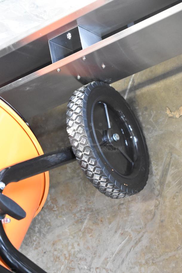 BRAND NEW Boltic SHAG-K07F metal electric heater, floor style, 208V, 1 phase. Visible wheel, minor scratches.