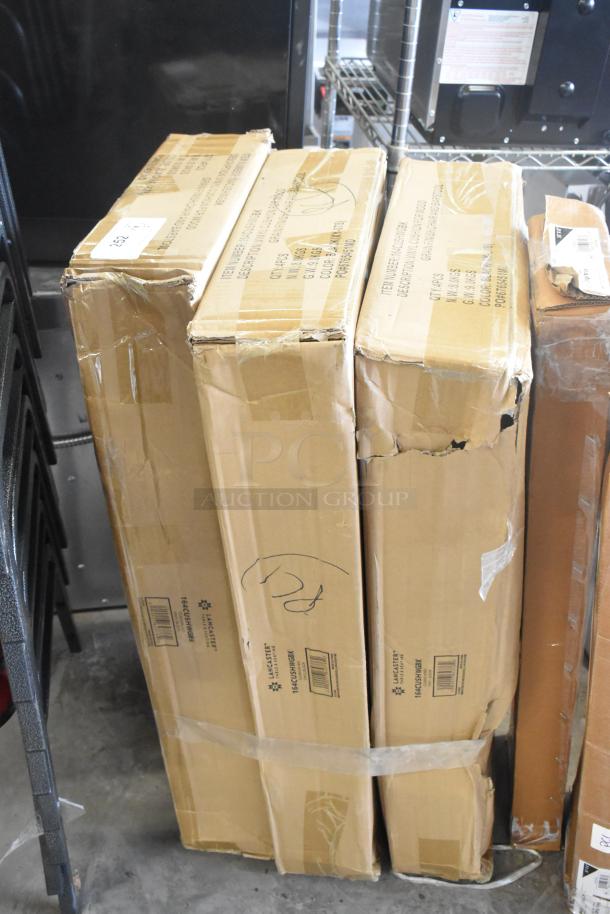 Three boxes of Lancaster Table & Seating 164CUSHWGBK Spartan black vinyl padded seats, scratch and dent condition.