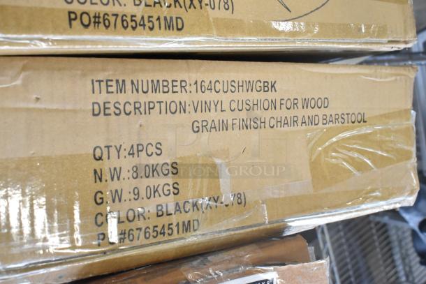 3 new boxes of Lancaster 164CUSHWGBK black vinyl cushions for chairs/barstools, slightly dented. 4 pieces per box.