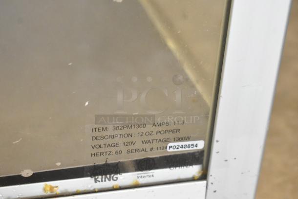 BRAND NEW SCRATCH AND DENT Carnival King 382PM1360 12 oz. Popcorn Machine, 120V, 1360W. Tags show item specs and serial.