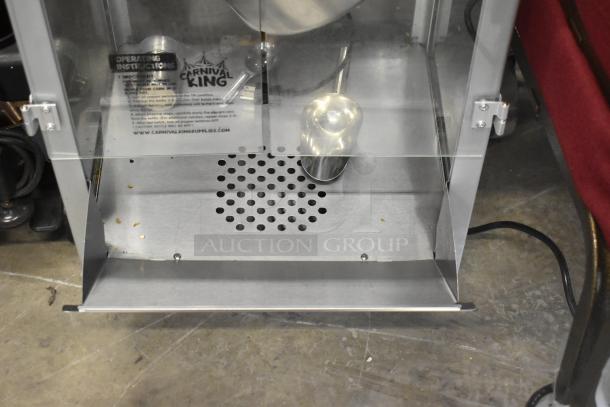 Carnival King PM1360 12 oz. popcorn machine, brand new with minor scratches. Includes a scoop. Model 382PM1360, 120V.