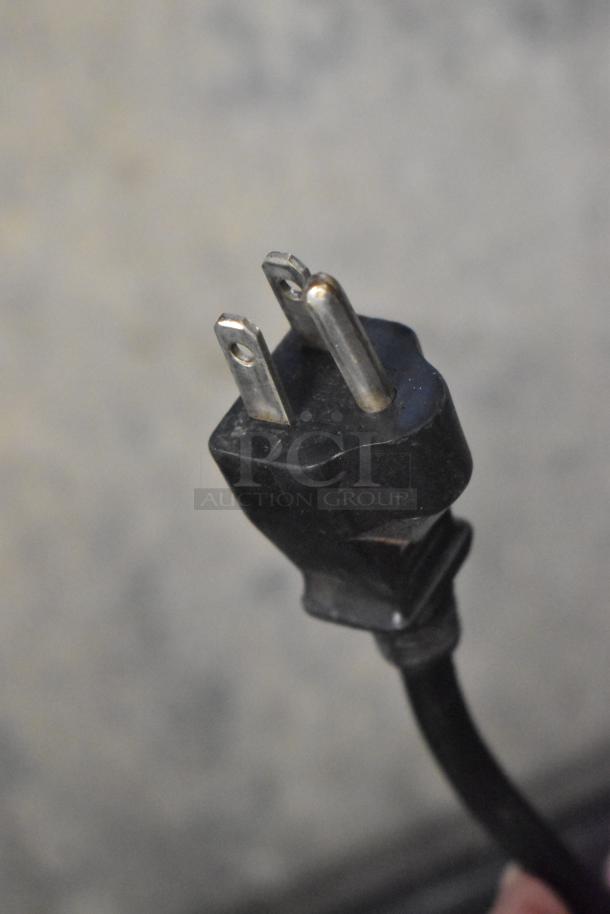 Bregani Metal Commercial Espresso Bean Grinder, missing lid, 115V, 1 phase; close-up of power plug displayed.