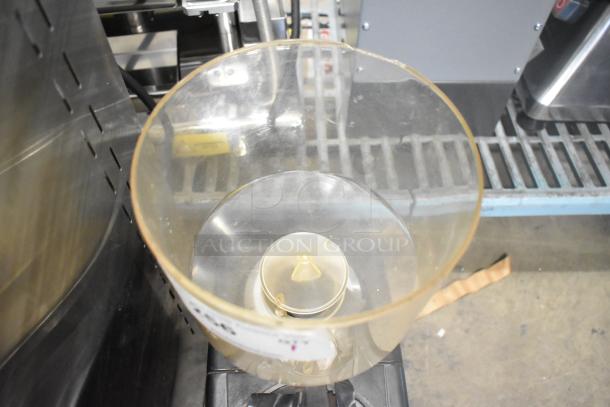 Bregani metal commercial countertop espresso bean grinder, missing lid, 115 volts, 1 phase, clear plastic hopper.