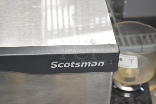 Scotsman Prodigy C1030MA-32B commercial ice machine in stainless steel, showing logo. 1077 lb. capacity, 208/230V, 1 Phase.