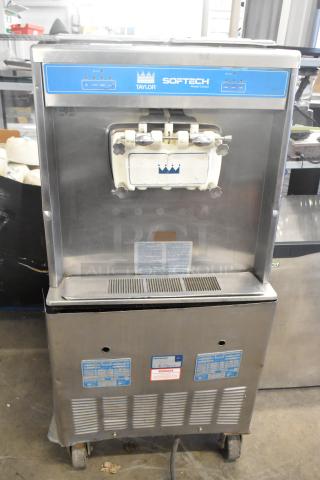 Taylor 754-27 Stainless Steel Commercial Floor Style Air Cooled 2 Flavor w/ Twist Soft Serve Ice Cream Machine on Commercial Casters. 208-230 Volts, 1 Phase. - Item #1222885