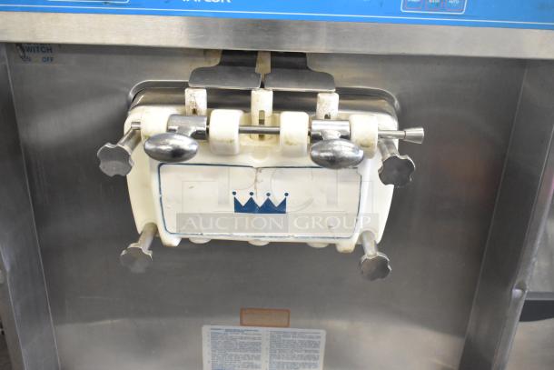 Taylor 754-27 stainless steel soft serve machine, 2-flavor with twist, air-cooled, commercial casters, 208-230V, 1 phase.
