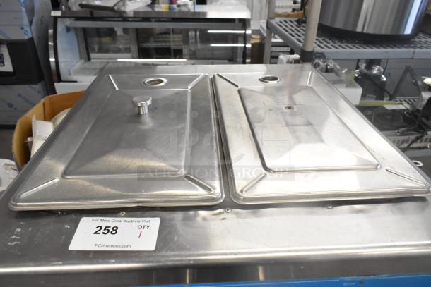 Taylor 754-27 stainless steel soft serve ice cream machine, air-cooled, 2-flavor with twist, on commercial casters.