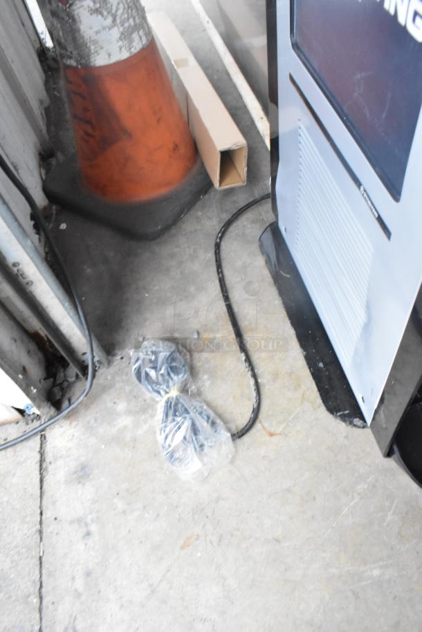 Stoelting C111-37 gravity-fed soft serve machine, brand new with minor scratches. Includes cords in plastic. Model SISCC111-37.