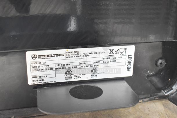 Brand new Stoelting C111-37 soft serve machine label. 115V, 1 phase, 1700W. Made in Italy. Minor scratches. Serial #004037.