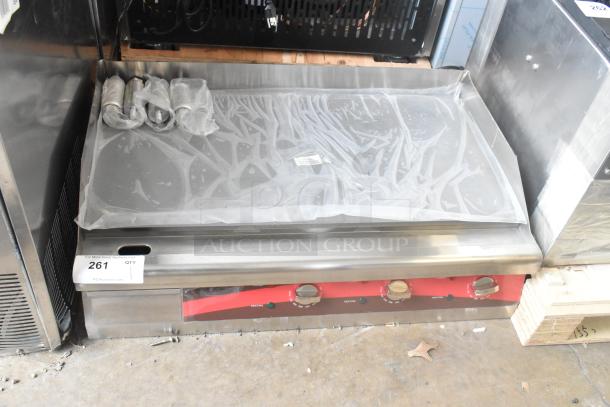 Brand new Avantco 177EG30N 30" stainless steel electric griddle, covered in protective plastic, showing control knobs. 208/240V, 1 phase.