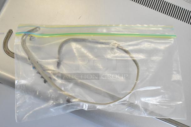 HP m1-u001dx Laptop with charger, silver exterior, includes visible USB ports, in good condition.