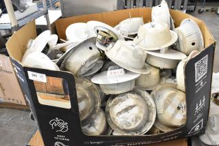 Pallet lot of Wheelock CBB-8 speaker enclosures, varied condition, labeled with "FIRE." Suitable for bulk purchase.