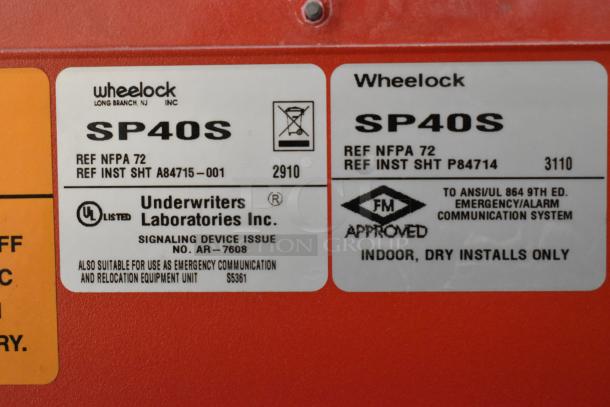 12 Wheelock PowerPath SP40S evacuation systems in red metal, NFPA 72 compliant, UL and FM approved for indoor use.