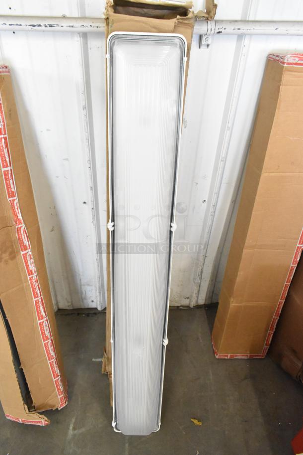 Boxes containing iSystems Lights, unopened, in original packaging. Nine boxes total. Ideal for energy-efficient lighting setups.