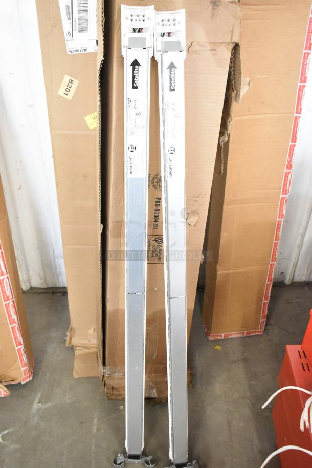 Boxes of iSystems lights, 9 units. Includes Satellite label. Items appear unused in original packaging.