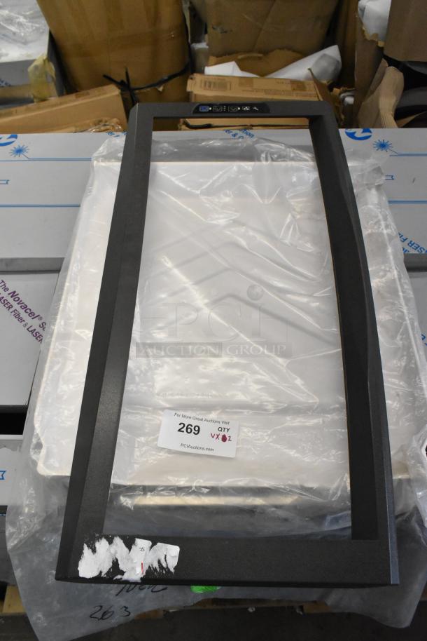 Brand new Manitowoc 4010989 ice machine water curtain and door frame, with scratch and dent features. Auction label visible.