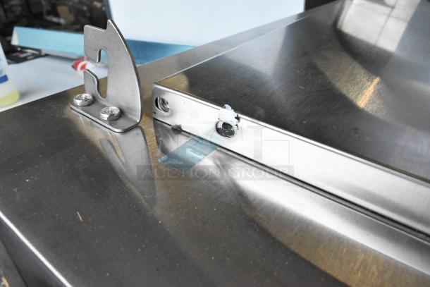 Brand new Avantco 178APPT71HC pizza prep table with stainless steel finish, visible scratches and dents, 115V, 1 Phase.