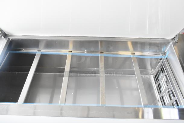 Brand new Avantco 178APPT71HC stainless steel pizza prep table, scratch and dent, 115V, 1 phase, commercial use.