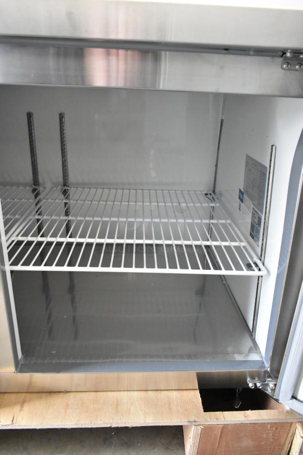 2025 Avantco 178APPT71HC stainless steel commercial pizza prep table, brand new, scratch and dent condition, 115V, 1-phase.