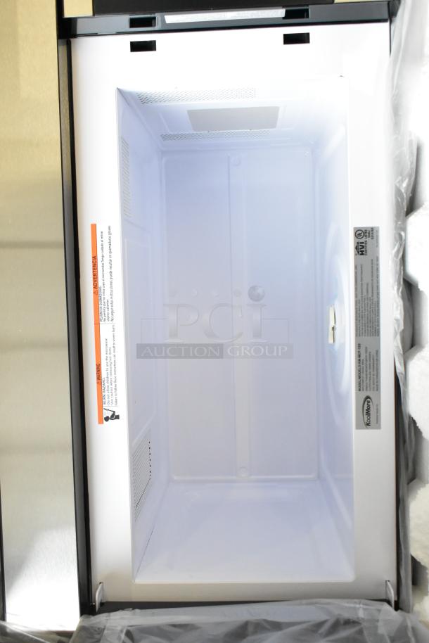 Brand new KoolMore KM-MOT-1SS microwave, stainless steel, 120V, some scratches. Includes plate, tags show model and warnings.