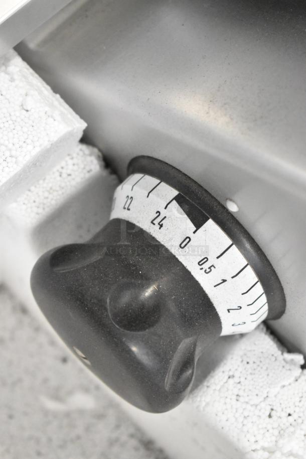 2018 Bizerba GSP H meat slicer dial close-up, showing thickness settings. Metal construction, 120V, 1 phase.