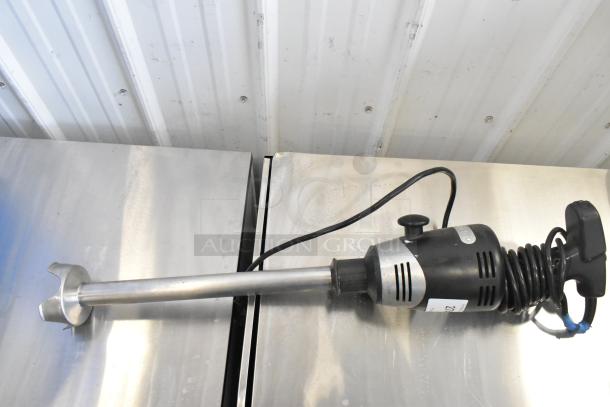 Waring WSB Immersion Blender, 120 Volts, 1 Phase. Stainless steel shaft, coiled cord, used condition. Model WSB.