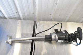 Waring WSB Immersion Blender, 120 Volts, 1 Phase. Stainless steel shaft, coiled cord, used condition. Model WSB.