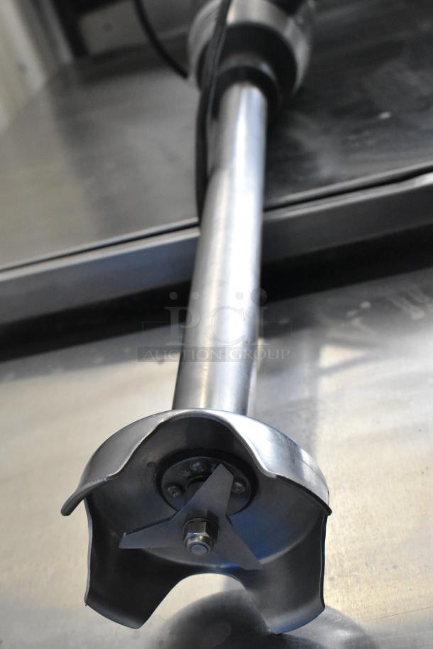 Waring WSB immersion blender, silver, 120 volts, 1 phase, stainless steel shaft, visible blade, excellent condition.