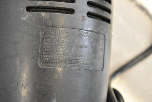 Waring WSB Immersion Blender, model WSB, 120V, 1 Phase, black. Label shows commercial use approval and manufacturing details.