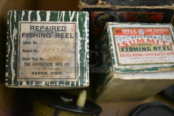 Repaired fishing reel box by The Pfluegers, Akron, Ohio. Contains repair, stock, and order numbers. Worn label.