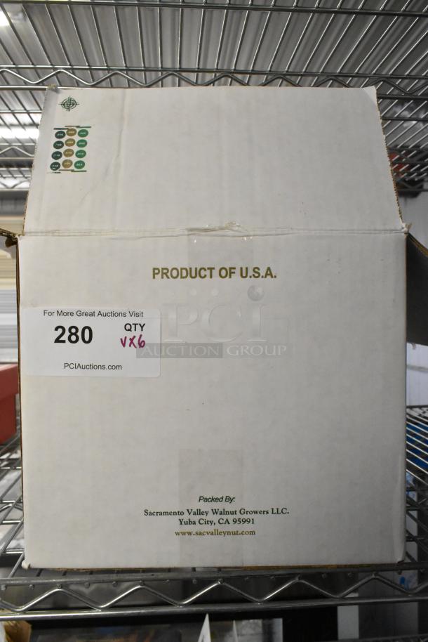 Box labeled "Product of U.S.A." containing 6 vehicle figurines: 1957 Chevy Bel Air, 1952 Chevrolet Pickup, 1951 Ford Pickup, 1932 Ford Panel Truck, 1926 Mack Stake Body. Auction ID 280.