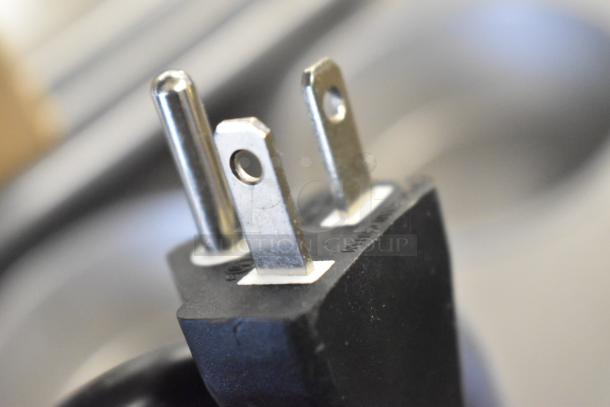 Close-up of a power plug for Avantco 177IC3500P induction range. Durable stainless steel, 208-240V, 1 phase.