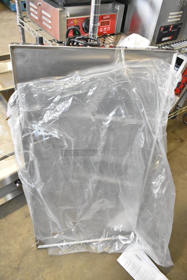 Brand new 2025 ServIt 423HSW2036 36" stainless steel heated shelf warmer, wrapped in plastic, 120V, 1 phase.