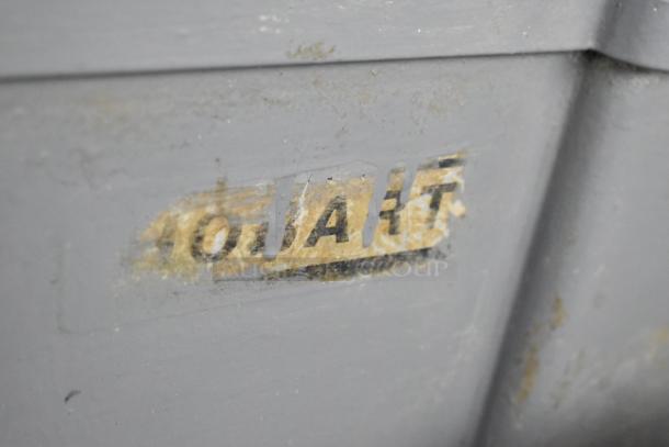 Worn Hobart logo on a metal surface of the Hobart L 800 mixer, indicating usage.
