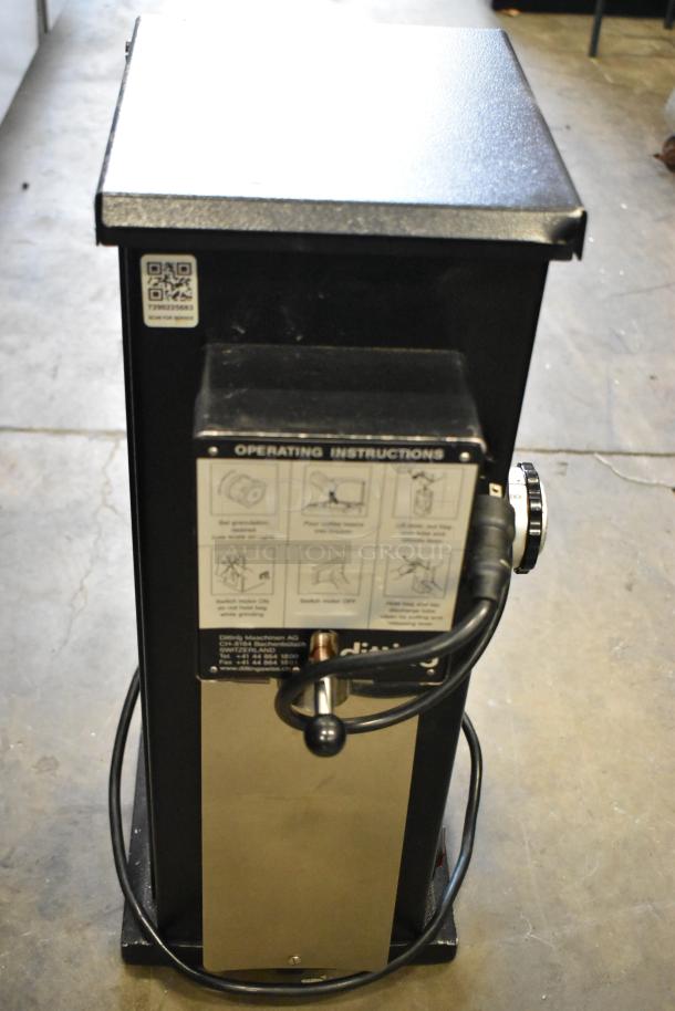 2016 Ditting KR1203 SB commercial coffee grinder, metal finish. Features operating instructions and QR code. 120V, 1 Phase.