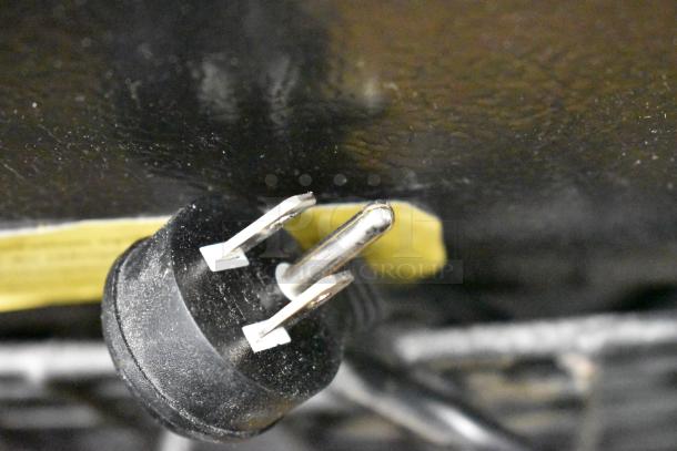 Close-up of a black power plug for Minus Forty 22-USGF-X1-1C000-BK commercial freezer. 115 volts, 1 phase.
