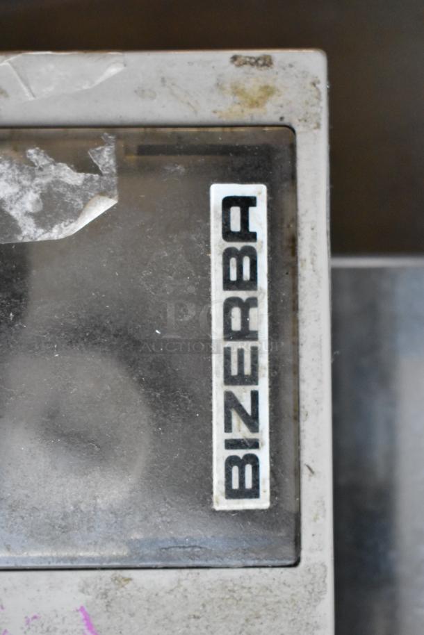 Bizerba BS 100 Metal Countertop Food Portioning Scale; visible wear; Bizerba logo displayed.