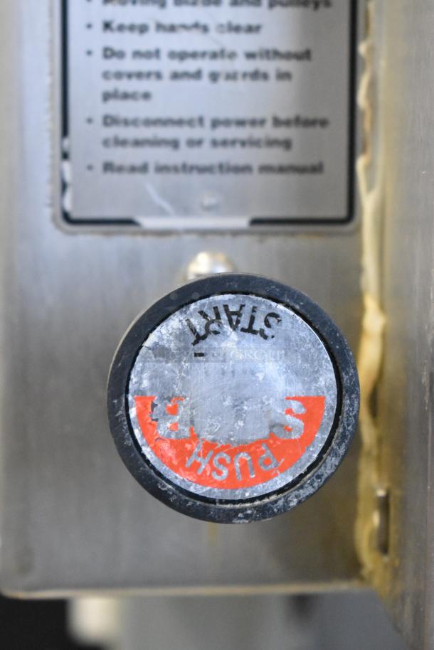 Hobart 6801 meat saw start button with worn "Push" label. Metal surface with safety instructions. 3 Phase, 200-230V.