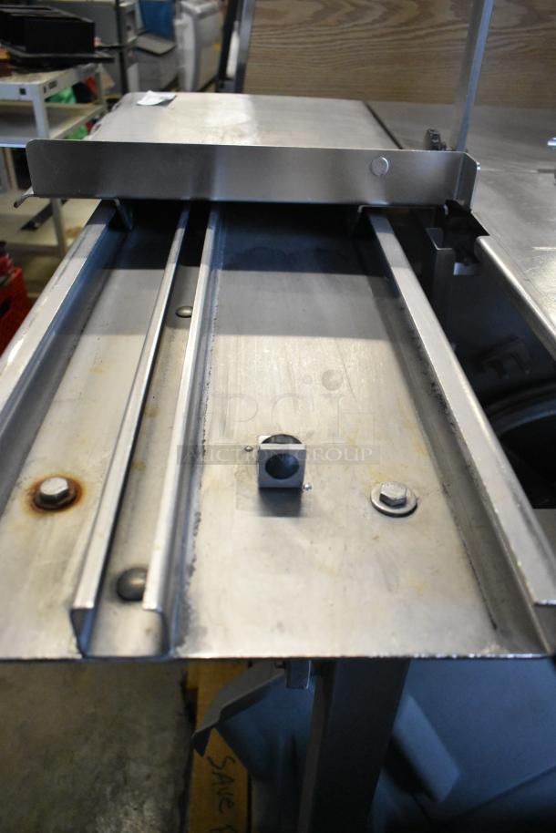 Hobart 6801 metal commercial meat saw, floor style, showing stainless steel track and fittings. 200-230V, 3 phase.